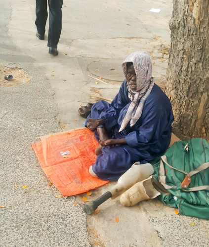Beggar in Dakar (RedConfidential)
